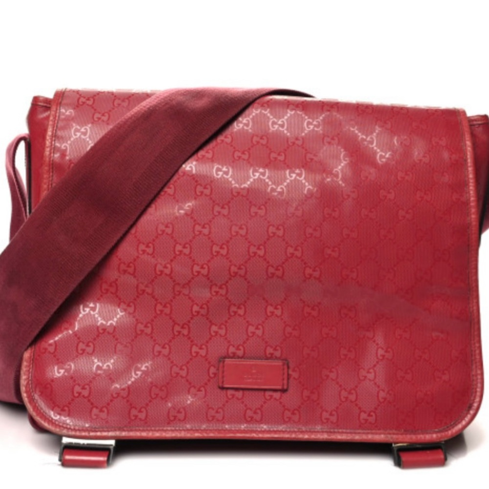 Gucci Diaper Bag ( Authentic) with Embossed Pattern and Modern Flap